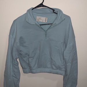 Cropped teal sweatshirt, quarter zip with pocket and elastic waist